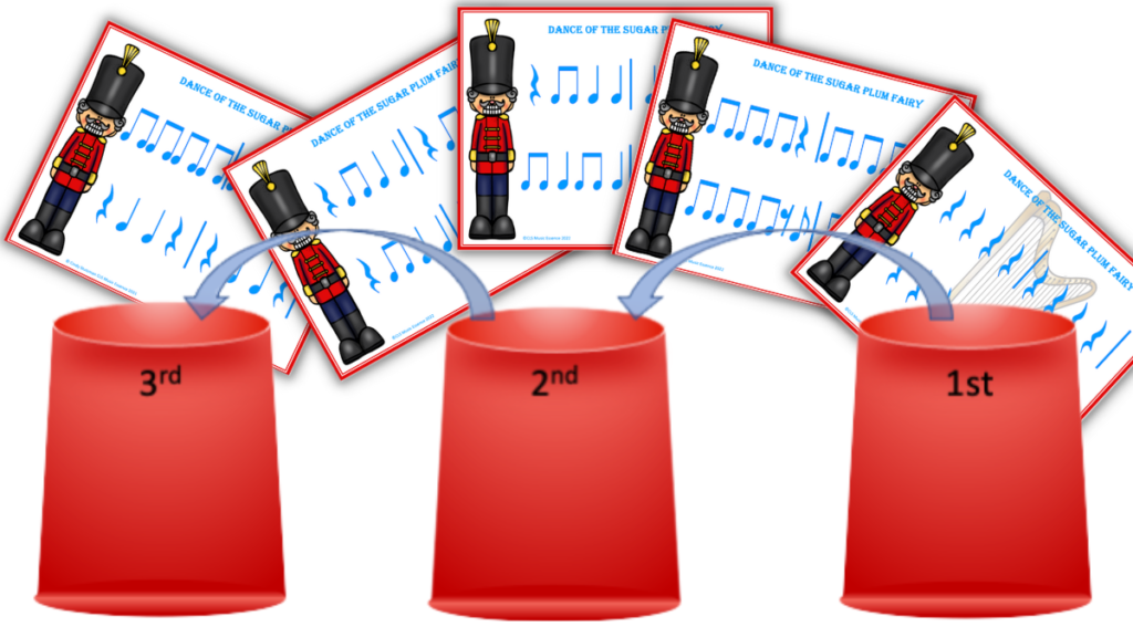 Three red buckets to drum with rhythm patterns to go with Dance of the Sugar Plum Fairy. 